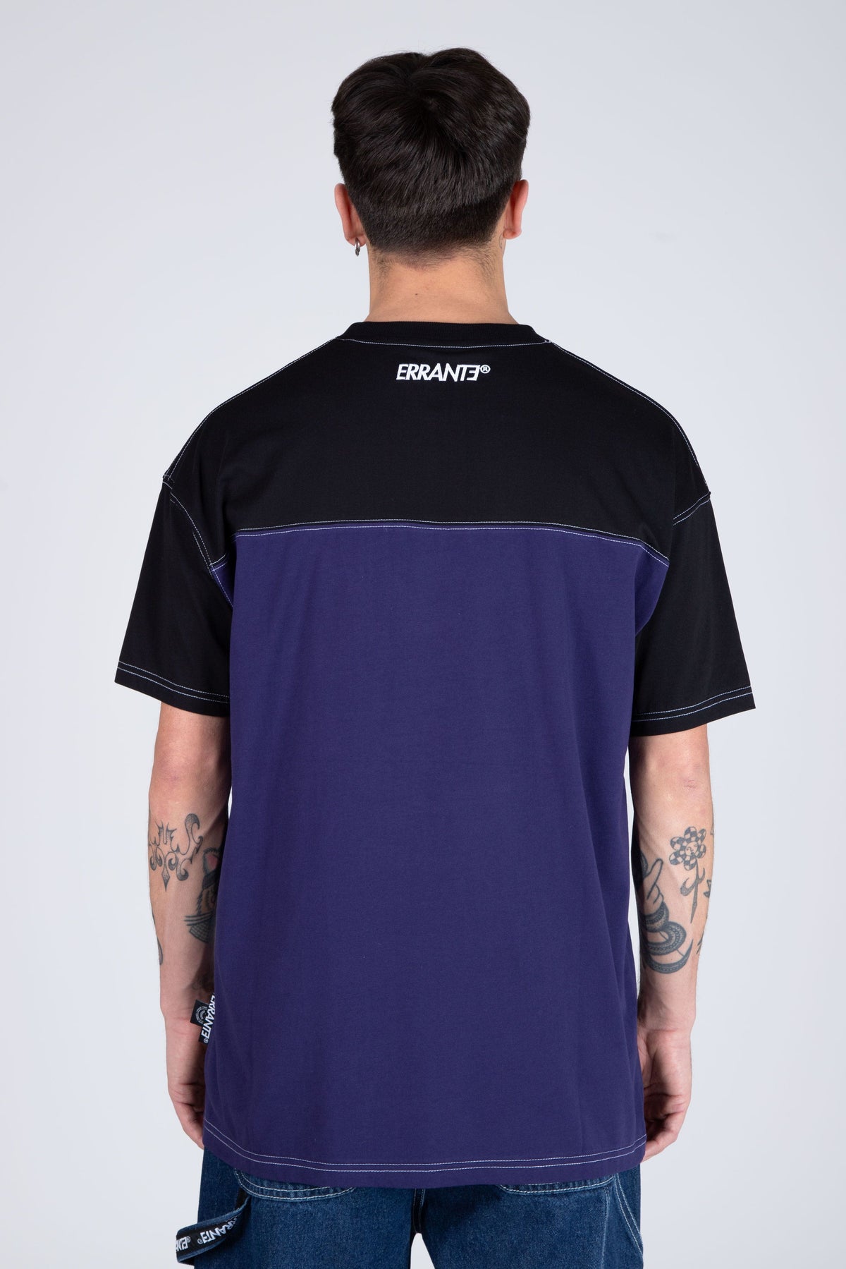Polera M/C Nomad Morado/Negro ERRANTE