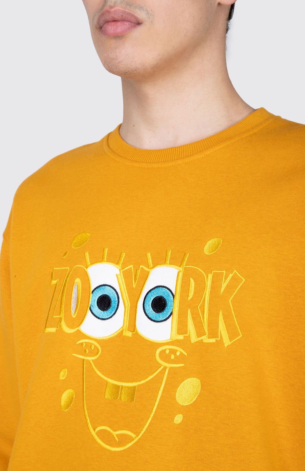 Poleron Crew Neck Bob Esponja Grin Mostaza Zoo York 