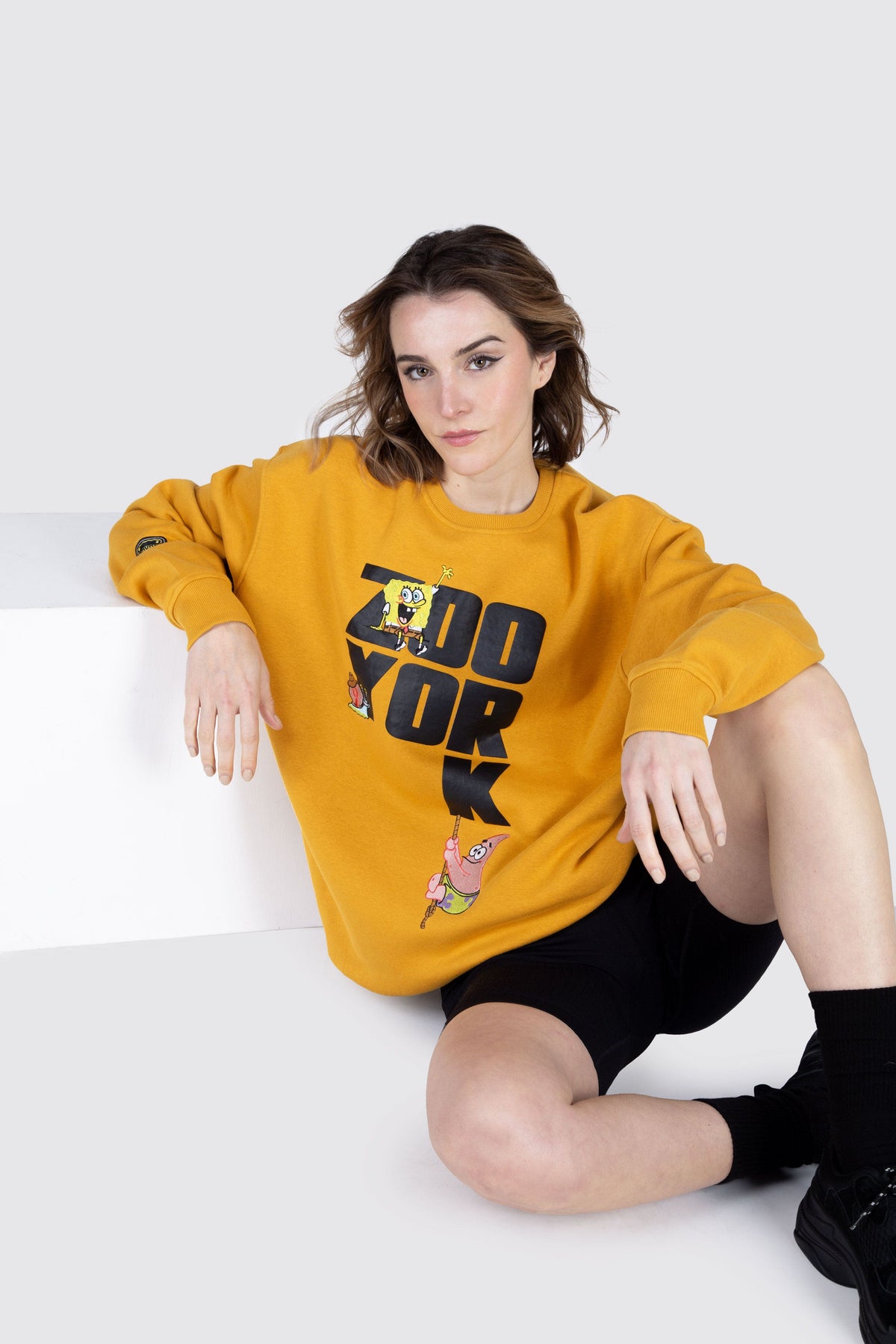 Poleron Crew Neck Bob Esponja Drop B Mostaza Zoo York