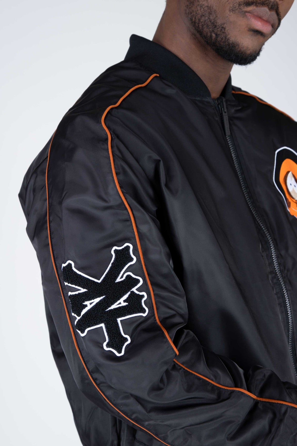 Chaqueta Reversible Bomber Kenny South Park Indestructible Negro Zoo York